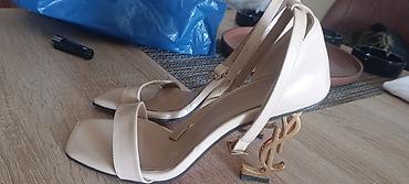 Ženska obuća: Saint Laurent Opium ženske sandale - Model: Opyum YSL Logo Heel — 1