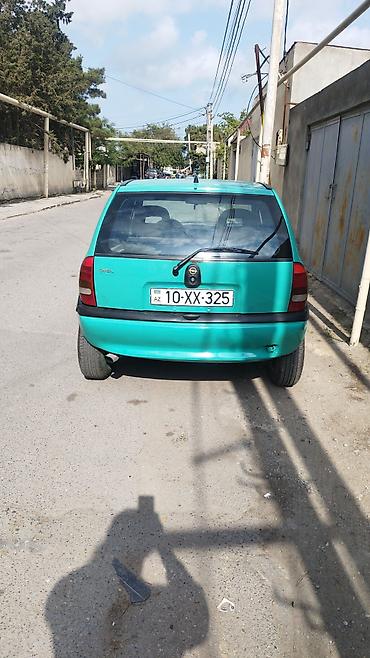 opel tiger: Opel Corsa, yaşıl rəng, 5 qapılı hetçbek. Texniki və dizayn — 2