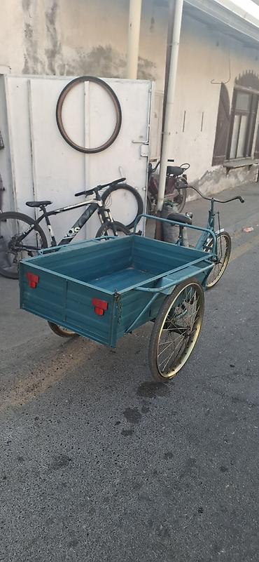 veıosiped: Yükdaşıma üçtəkərli velosiped yaxsi vezziyetdir unvan Merdekan — 3