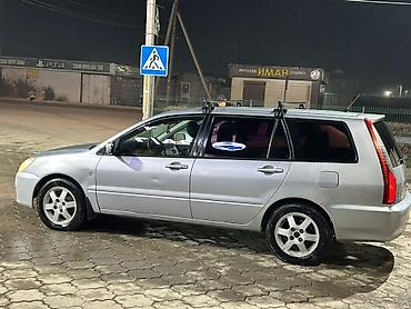 авто стенд: Mitsubishi Lancer: 2004 г., 1.6 л, Механика, Бензин, Универсал — 1