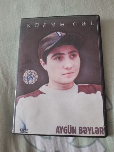 DVD və Blu-ray pleyerlər: Aygün Bəylərin iştirakı ilə "Kosməkçi" DVD diski. Diskin üzərində