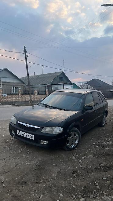 наклейки бмв: Mazda 323: 1999 г., 1.5 л, Механика, Бензин, Универсал — 2