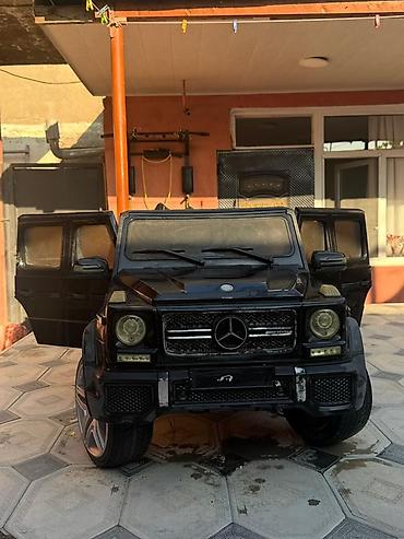 oyuncaq masin type 1 per page 40: Uşaq elektro avtomobili – Mercedes-Benz G65 AMG (qara) — 1