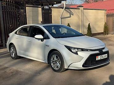byd e2: Toyota Corolla: 2021 г., 1.8 л, Вариатор, Гибрид, Седан — 5