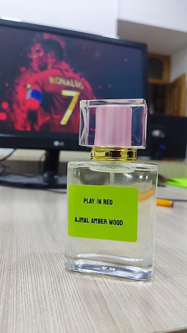 gucci rush: Məhsul: “Play in Red – Ajmal Amber Wood” ətir ekstraktı Təsvir: - — 1