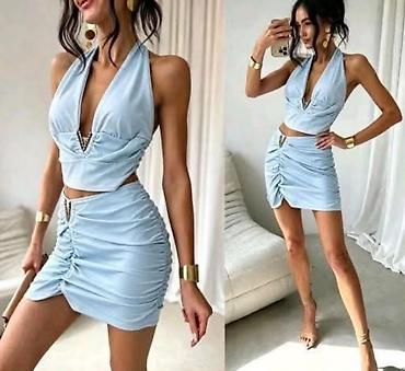 aksa: Suknjica i crop top majica komplet.Majica se vezuje oko vrata sa — 3