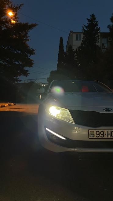 kia carnival: Kia Optima – ağ rəng, sedan, idman üslublu eksteryer paketli. Əsas — 4