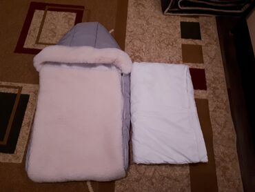муслиновые одеяла: Продаю кокон. Отличный вариант на выписку. В комплекте имеется одеяло