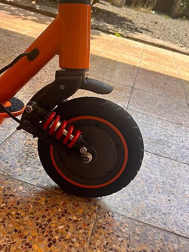 elektron saz: Elektrik skuter – narıncı rəng Xüsusiyyətlər: - Geniş, sürüşməyə — 4