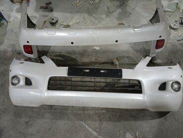 обвес lx 570: Передний Бампер Toyota Б/у, цвет - Белый