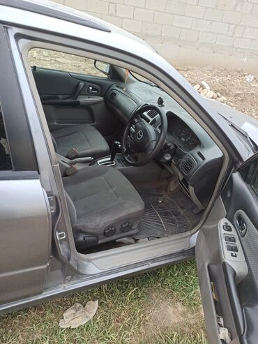 Mazda: Mazda 323: 2002 г., 1.5 л, Автомат, Бензин, Универсал