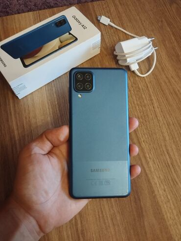 samsung galaxy music: Samsung Galaxy A12, 64 ГБ, цвет - Голубой, Отпечаток пальца, Face ID, Две SIM карты