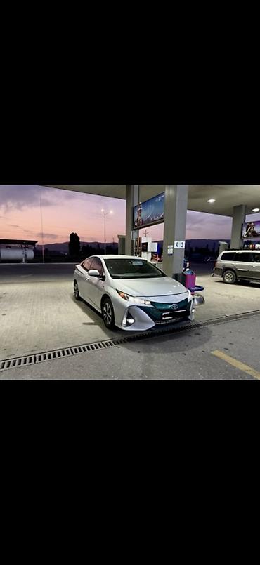 roewe ei5 2021: Toyota Prius: 2017 г., Гибрид, Хэтчбэк — 4