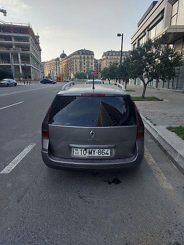 Renault: Renault Megane Grandtour (universal), boz rəng. Əsas xüsusiyyətlər: - — 5