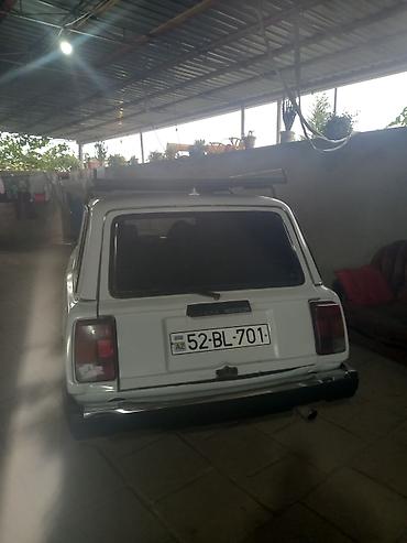 m50n satisi: LADA 2104 universal, ağ rəngli. Klassik kuzovlu 5 qapılı — 4