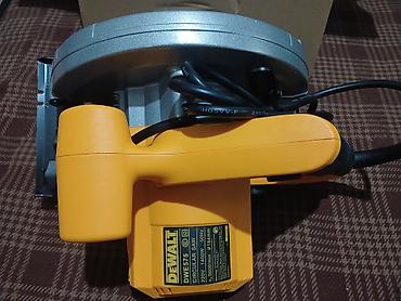 Циркулярные электропилы: Циркулярная пила DeWALT DWE575 (7-1/4", 184 мм) - Диаметр диска: 184 — 4