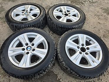 Комплект из 4 зимних колес BMW на легкосплавных дисках. - Диски