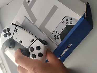 Игровая приставка Game Stick Pro (4K) с двумя беспроводными геймпадами — 1