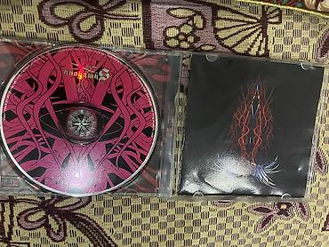 с вырезом: Аудио-CD (музыкальный диск) в стандартном пластиковом боксе — 1
