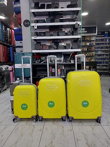 Çamadanlar: Sərnişin çamadan dəsti – parlaq sarı rəng, 3 ölçü - 3-lü dəst: kiçik — 1