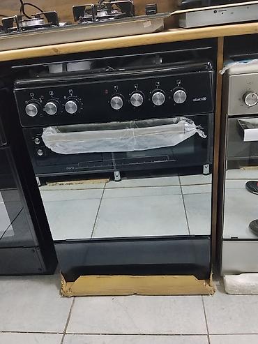 Кухонные плиты и варочные поверхности: Газовая плита с духовым шкафом Oivo, выполненная в черном цвете — 1