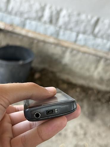kontakt iphone 15 pro: Samsung S5610, rəng - Qara, Düyməli — 9