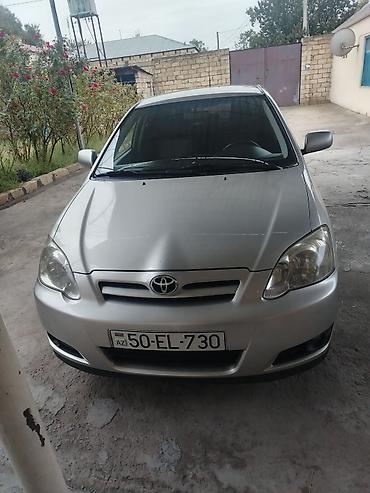 tra: Toyota Corolla hatchback (E120) – gümüş rəng. Texniki xüsusiyyətlər — 3