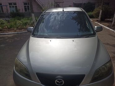 автомобили в рассрочку без первоначального взноса: Mazda Demio: 2004 г., 1.3 л, Автомат, Бензин, Хэтчбэк
