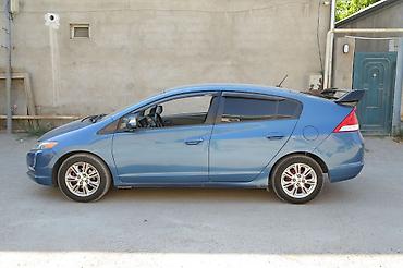 Honda: Honda Insight Hybrid, mavi rəng, 5 qapılı liftbek gövdə. Əsas — 2