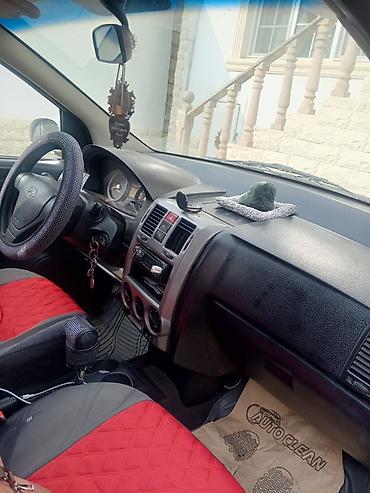 porsche satisi: Hyundai Getz, 5 qapılı şəhər hetçbeki Xarici görünüş: - Gümüşü rəngdə — 5