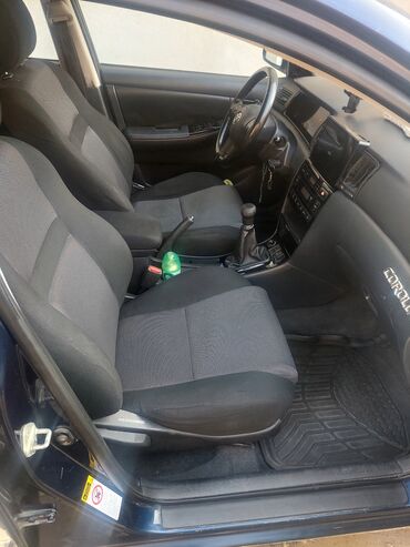 Toyota: Toyota Corolla: 1.4 l | 2004 il Sedan — 5