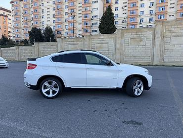 BMW: BMW X6 – ağ rəngli, kupe-siluetli premium krossover. Güclü və dinamik — 2