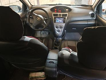 panel vurmaq: Toyota Yaris: 1.3 l | 2008 il Sedan — 3