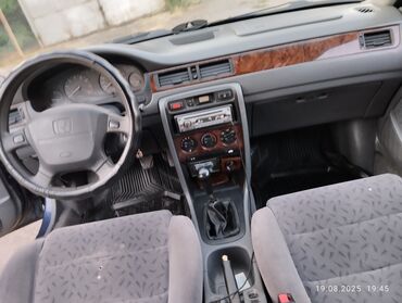 бу шины бишкек: Автомобиль Honda Integra тёмно-синего цвета с серой тканевой обивкой