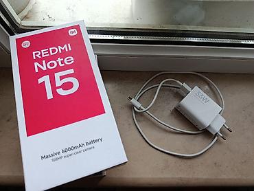 Mobil telefonlar: Redmi 128 GB, rəng - Qara, Zəmanət — 3