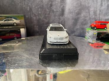 Avtomobil modelləri: Коллекционная модель BMW 750i F02 white 2008 RASTAR Scale 1:43 Art — 8