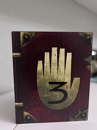 Китептер жана журналдар: Книга «Дневник №3» из вселенной Gravity Falls. Описание: - — 1
