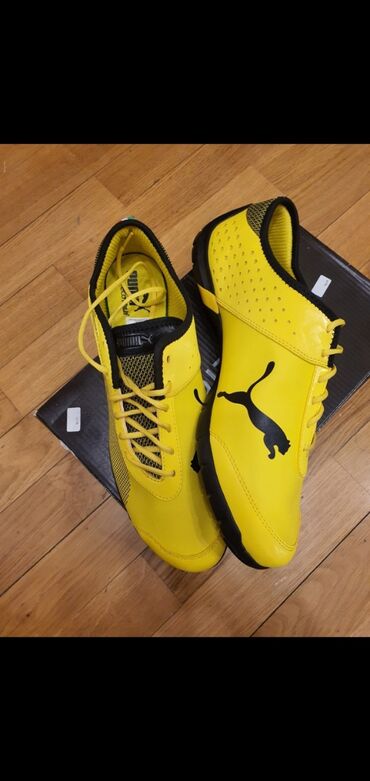 Krasofkalar və idman ayaqqabıları: Puma Ferrari idman ayyaqabı. Türkiyədən alınıb. Orijinaldı. Ölçüsü — 1