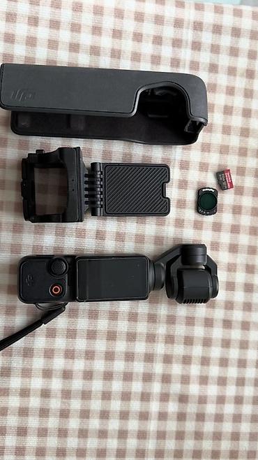 Видеокамеры: Карманная камера со стабилизатором DJI (линейка Osmo Pocket/ Pocket) с — 1