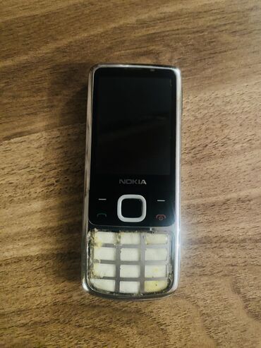 poco telefonları: Nokia 6700 Slide, rəng - Gümüşü, Düyməli