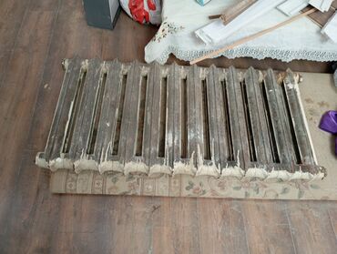 железные топчаны: Чугунная секционная батарея (радиатор отопления) классического типа