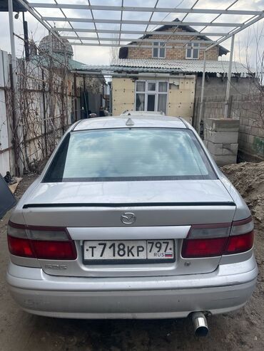 прямоточный глушитель: Mazda 626: 1998 г., 1.8 л, Механика, Газ, Седан