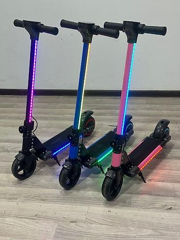 elektrik skuterlər: Şəhər içi hərəkət üçün müxtəlif skuter modelləri Mexaniki şəhər — 3