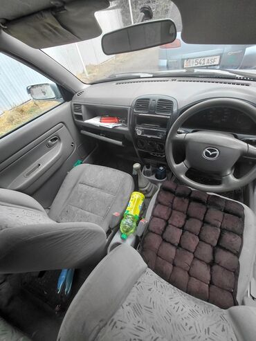 машина в кридит: Mazda Demio: 2001 г., 1.3 л, Механика, Бензин, Хетчбек