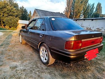 e klass: Mazda 323: 1989 г., 1.6 л, Механика, Бензин, Седан — 2