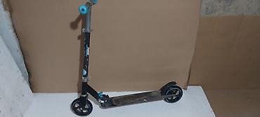 Trotineti, skejtbordovi i hoverbordovi: Trotinet Oxelo (Decathlon) – model sa velikim točkovima - Dva točka — 9