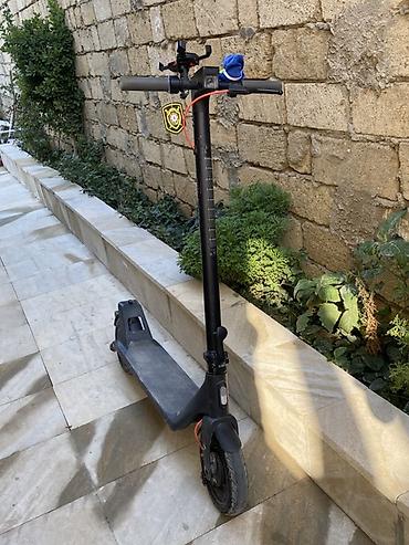 elektrikli velosiped satışı: Elektrik skuter – qara rəng, şəhər içi rahat və qənaətli gediş üçün — 1