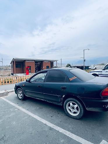 mazda 326: Mazda 323: 1995 г., 1.6 л, Автомат, Бензин, Седан — 1