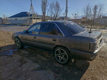 Mazda: Mazda 626: 1999 г., 2.2 л, Механика, Бензин, Седан