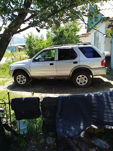 выбор номера о: Isuzu Rodeo: 2000 г., 3.2 л, Автомат, Внедорожник — 7